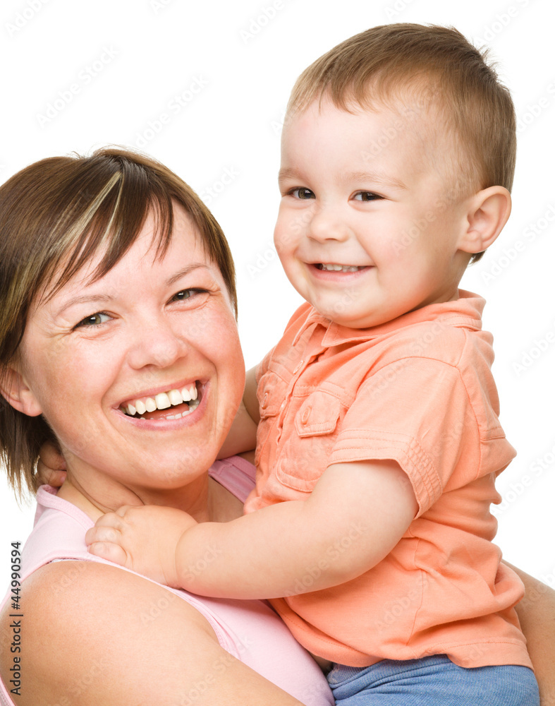 Portrait of a happy mother hugging her son Portrait of a happy mother hugging her son