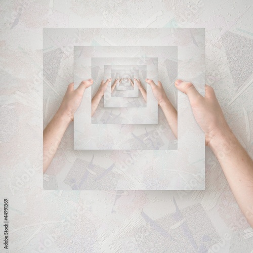Infinity frame illusion. Recursion: hand holding a square picture of a hand holding a square picture of a hand holding a square picture of a...  photo