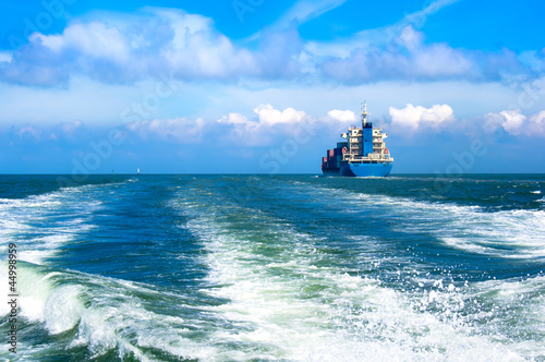 Cargo ship sailing in to the sea