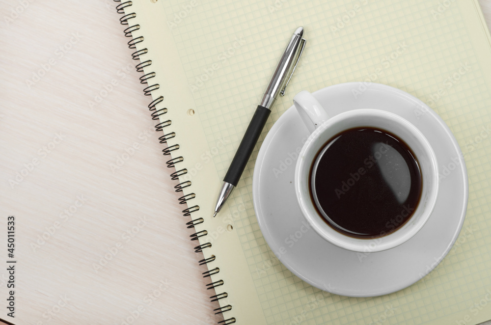 Coffee cup with note book Coffee cup with note book