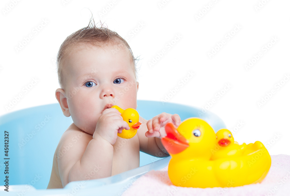 baby kid taking bath and playing