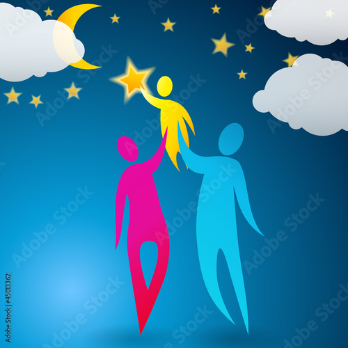 Couple helping their child reach the stars