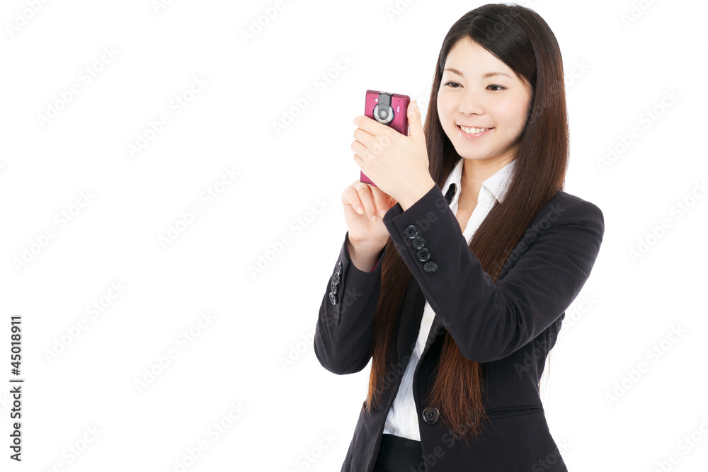 Beautiful young business woman using a cellular. Portrait of Beautiful young business woman using a cellular. Portrait of