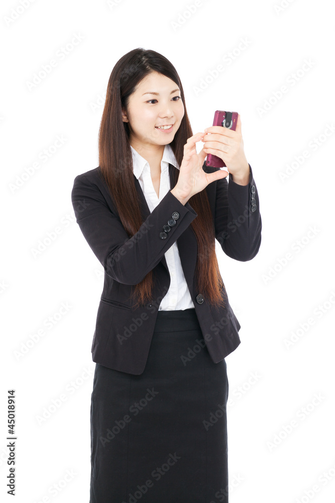 Beautiful young business woman using a cellular. Portrait of Beautiful young business woman using a cellular. Portrait of
