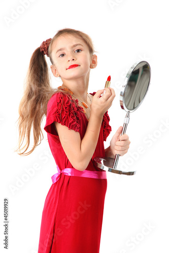 little girl in her mother's...