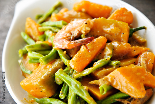 Asian Vegetable Cuisine with Seafood in Coconut Milk