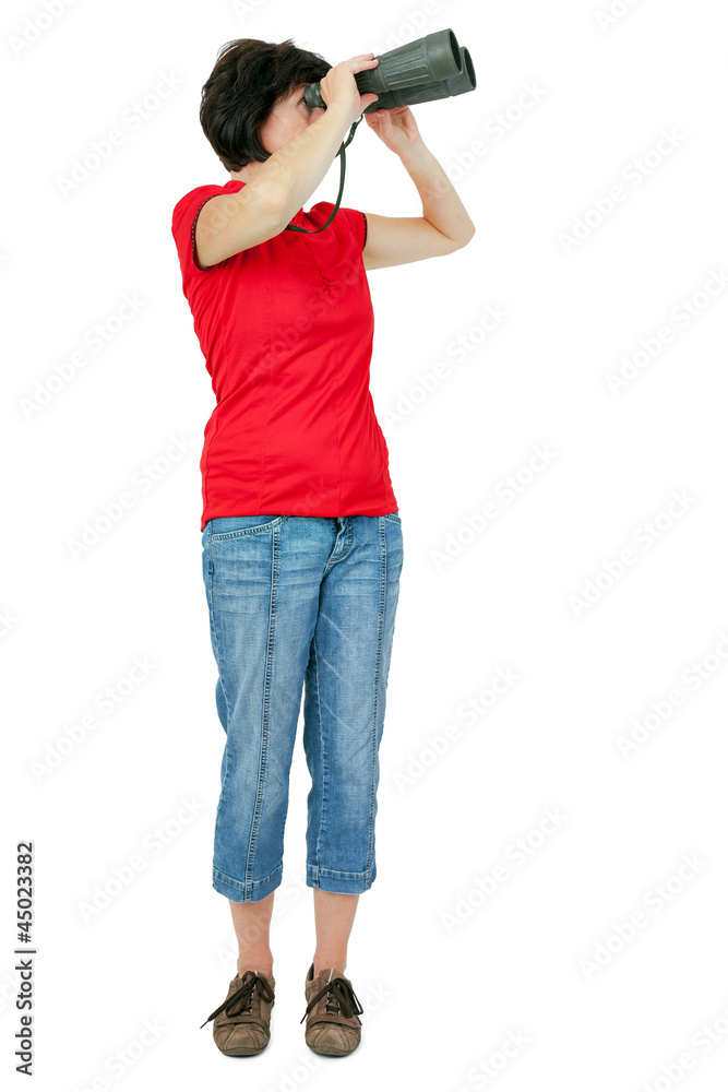 Woman looks through binoculars Woman looks through binoculars