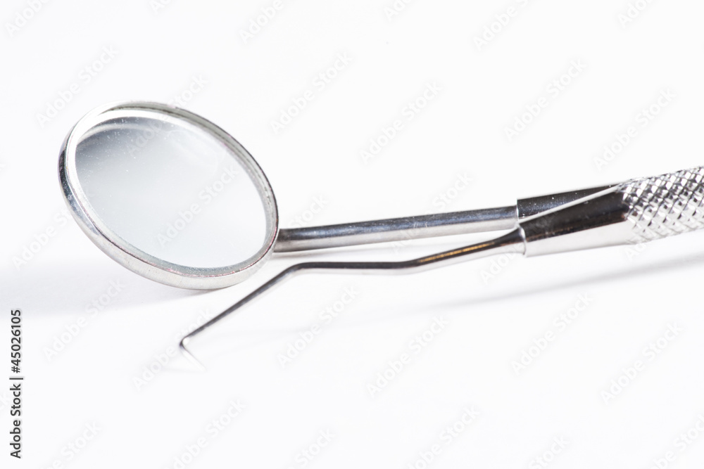 Two Dental Tools : Dental mirror and probe Two Dental Tools : Dental mirror and probe