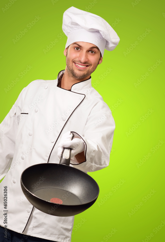 Portrait Of A Chef Holding A Pan Portrait Of A Chef Holding A Pan