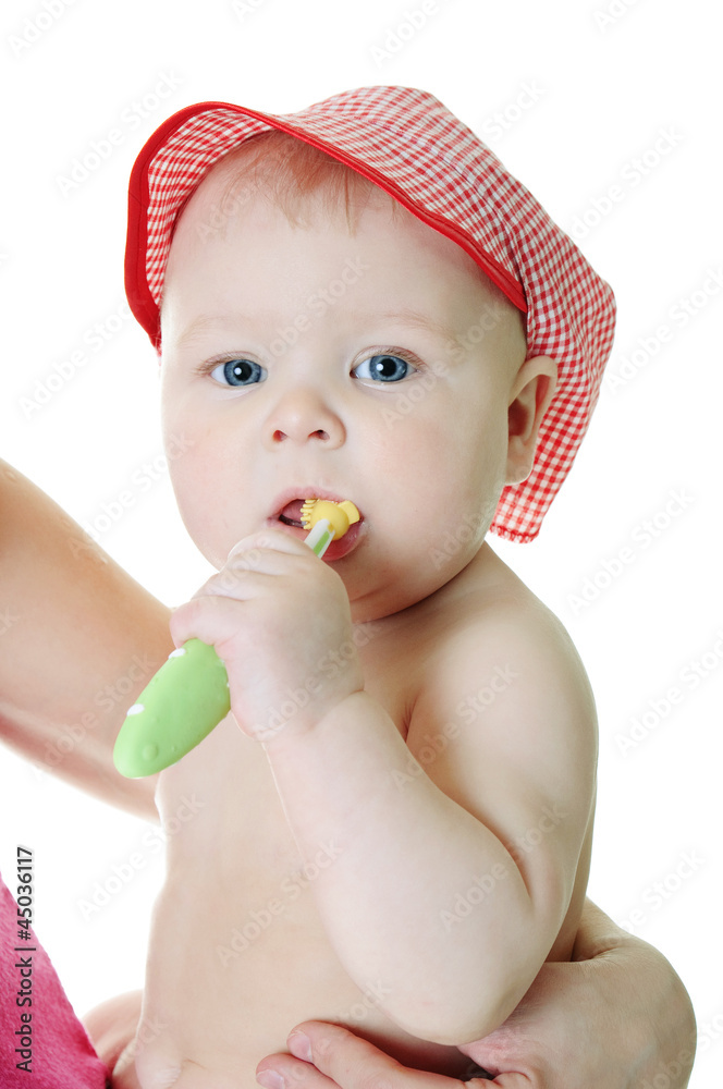 Little baby girl with teething brush Little baby girl with teething brush