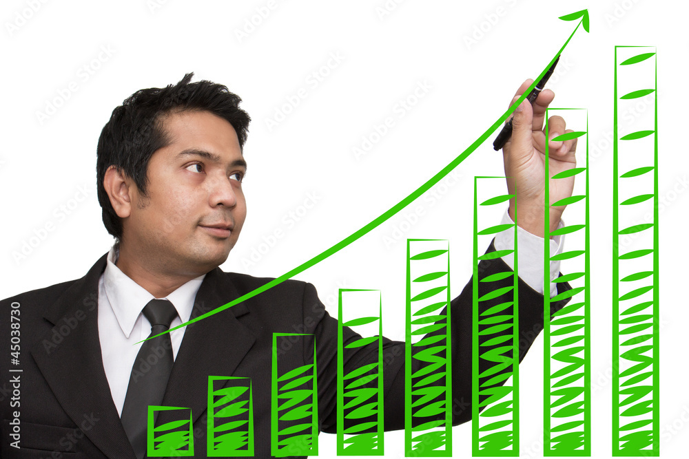 Businessman drawing graph on the board Businessman drawing graph on the board