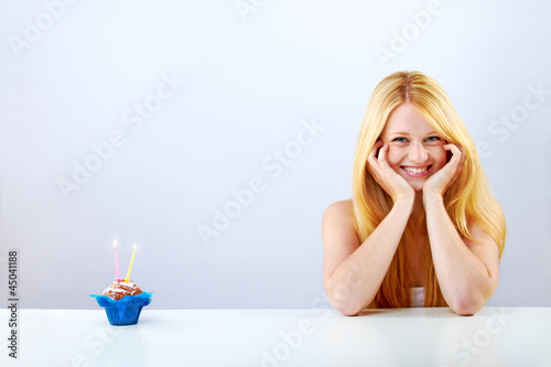 beautiful happy woman clebrating her birthday photo