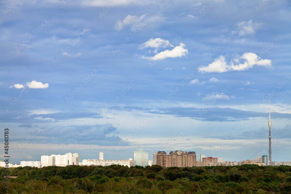 blue autumn sky with clouds under city blue autumn sky with clouds under city