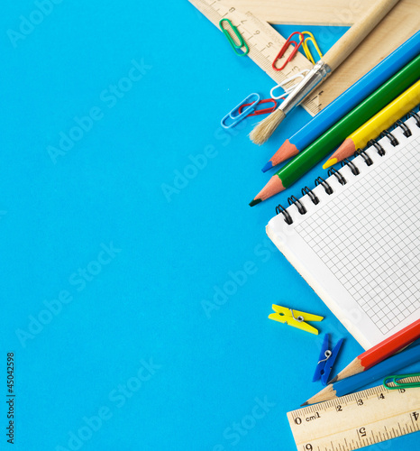 School stationery on the blue with copy space