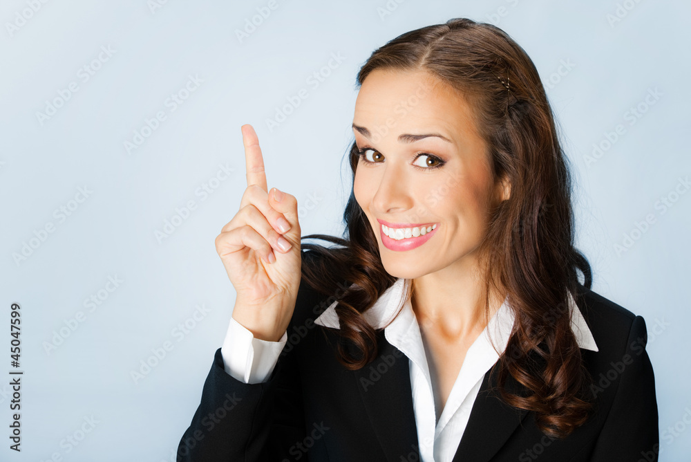 Businesswoman showing blank area for copyspase Businesswoman showing blank area for copyspase