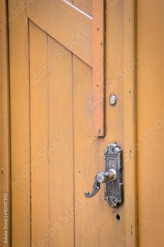Wood door and door handle © byjeng