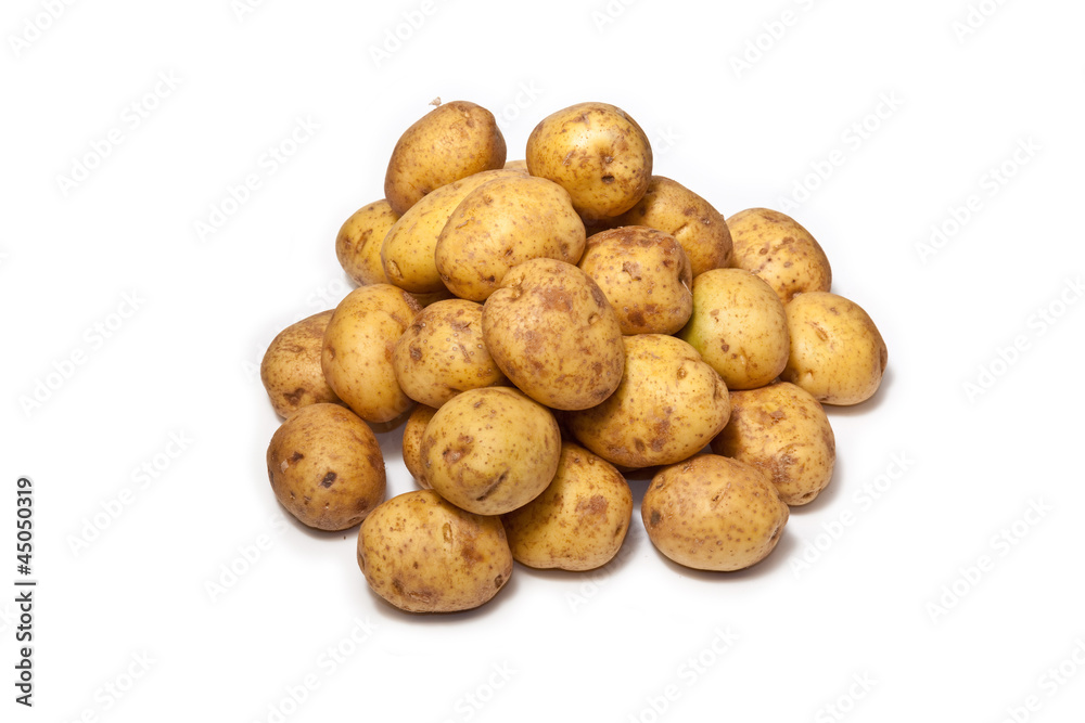 White Potatoes isolated on a white studio background. White Potatoes isolated on a white studio background.