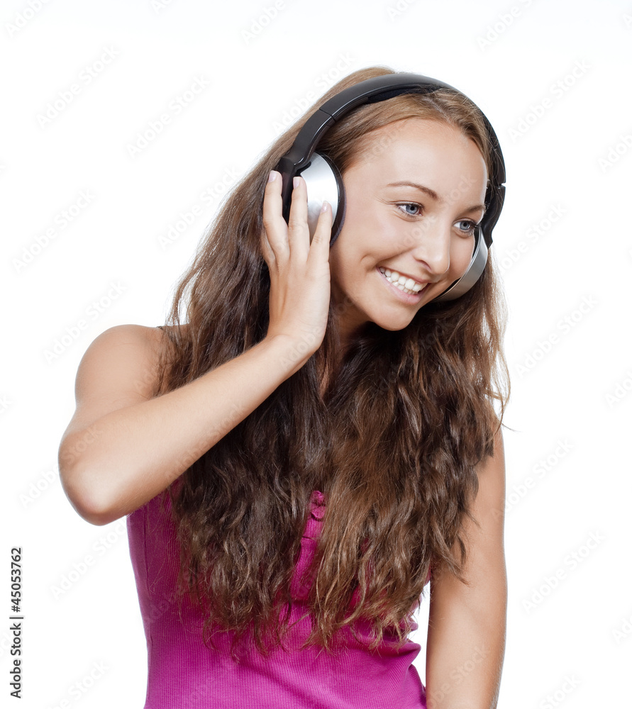 Fototapeta premium young girl listening to music