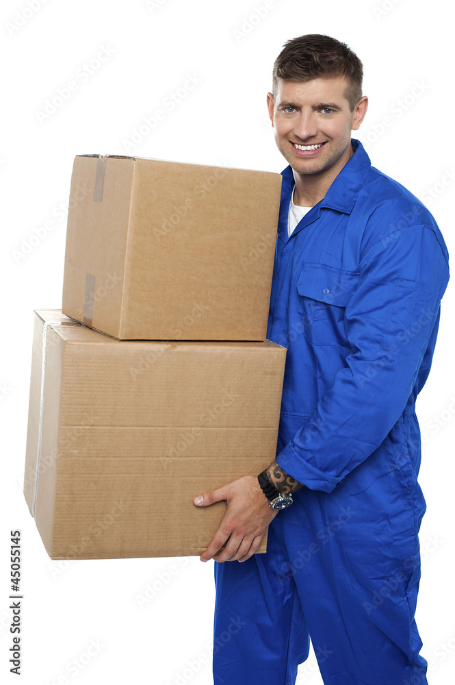 Relocation assistant staff carrying cardboard boxes Relocation assistant staff carrying cardboard boxes
