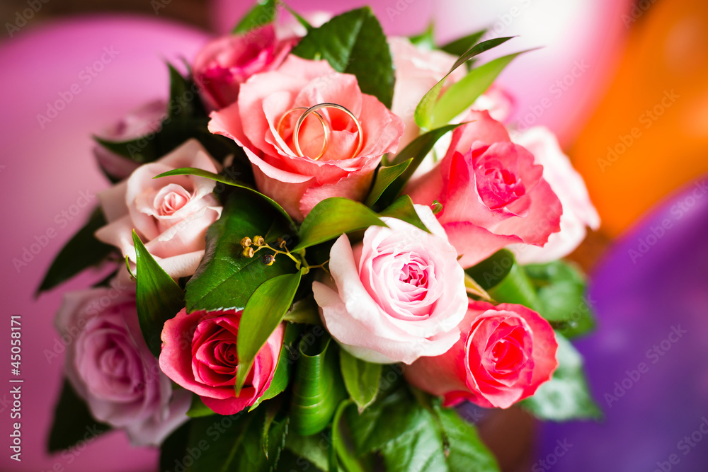 Two wedding rings on bridal bouquet Two wedding rings on bridal bouquet