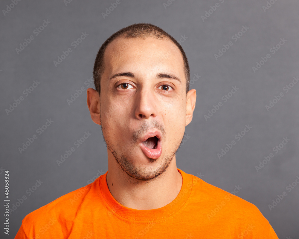Obraz premium Young Man Portrait on Grey Background