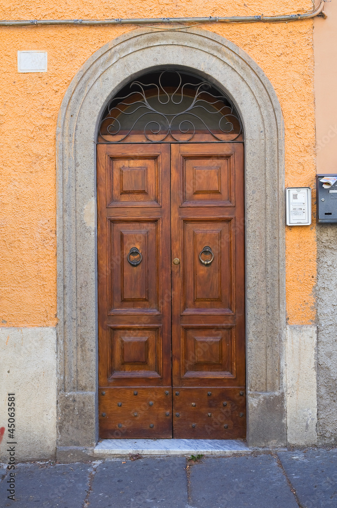 Wooden door. Bagnaia. Lazio. Italy.