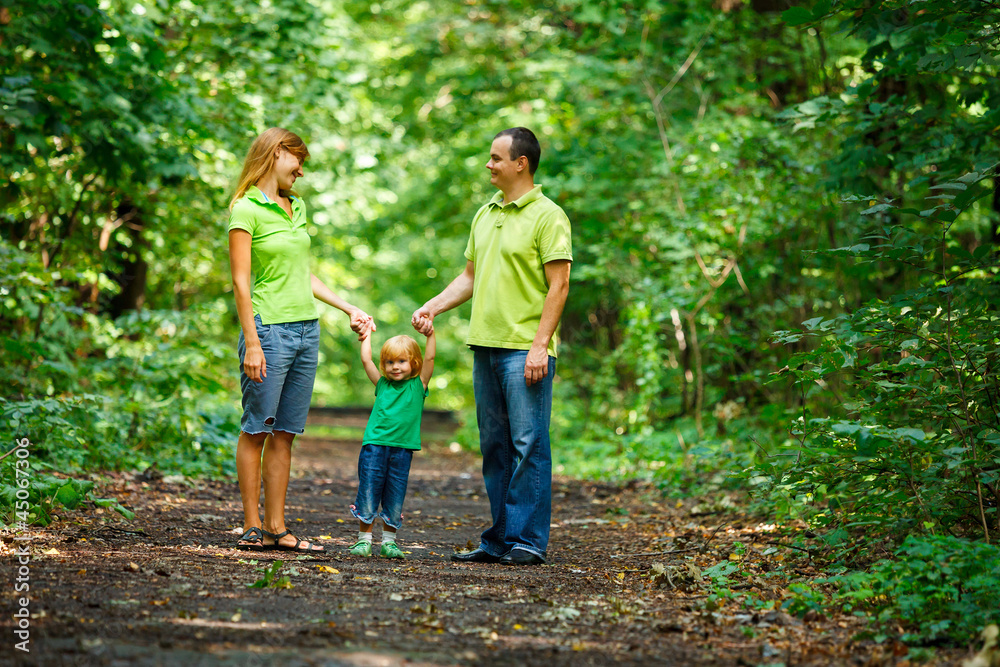 Portrait of Happy Family In Park