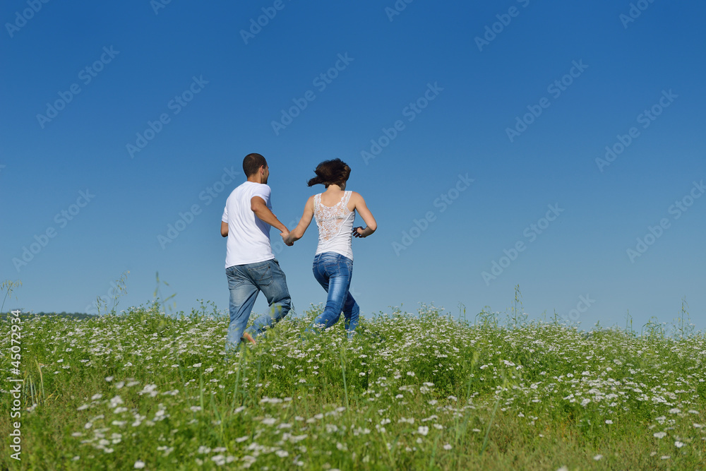 happy couple in wheat field