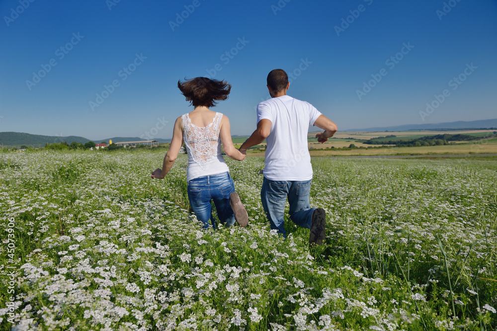 happy couple in wheat field happy couple in wheat field