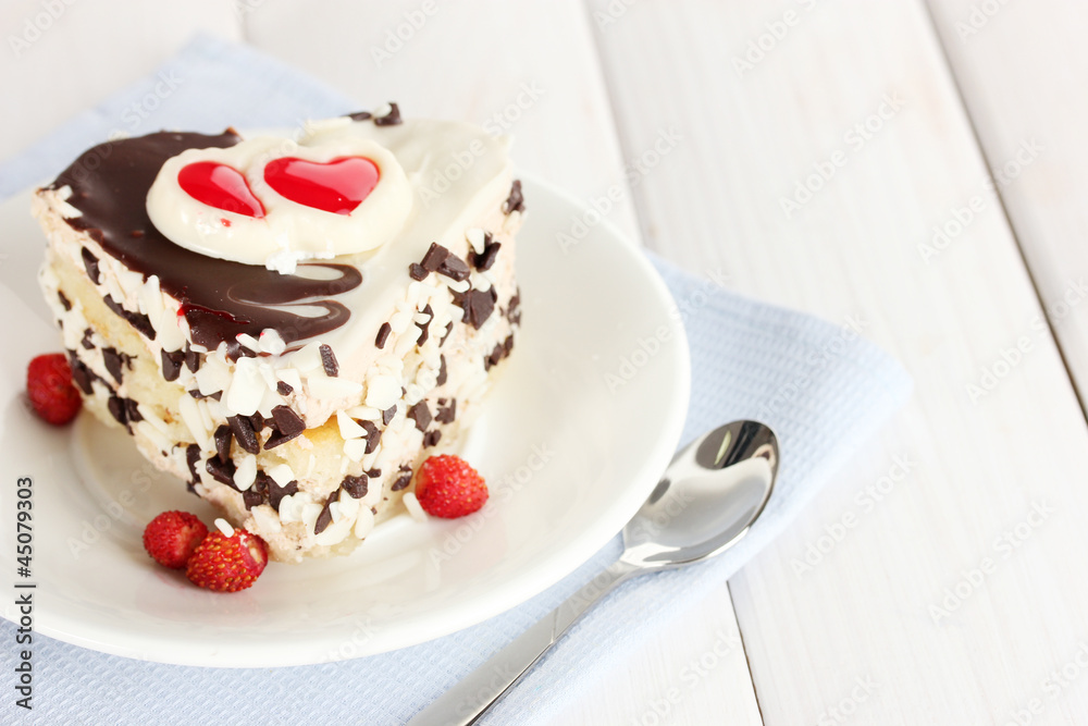 sweet cake with chocolate on plate on wooden table sweet cake with chocolate on plate on wooden table
