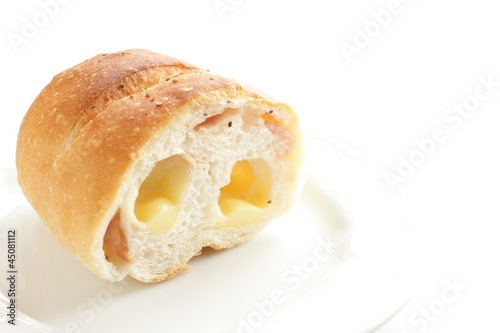 close up of baguette with cheese inside