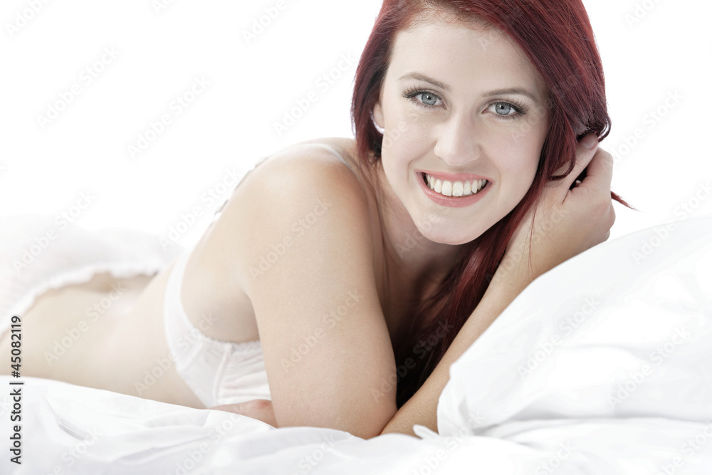 Fototapeta premium Woman in underwear on bed