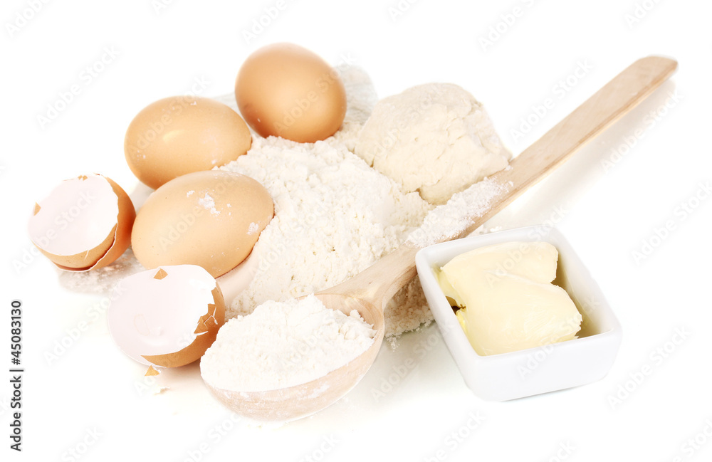 Fototapeta premium Eggs, flour and butter isolated on white