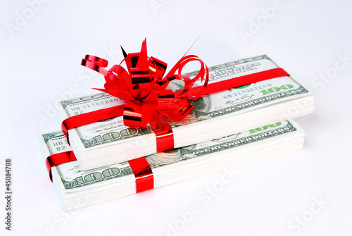 Pack of the American money as a gift on white background
