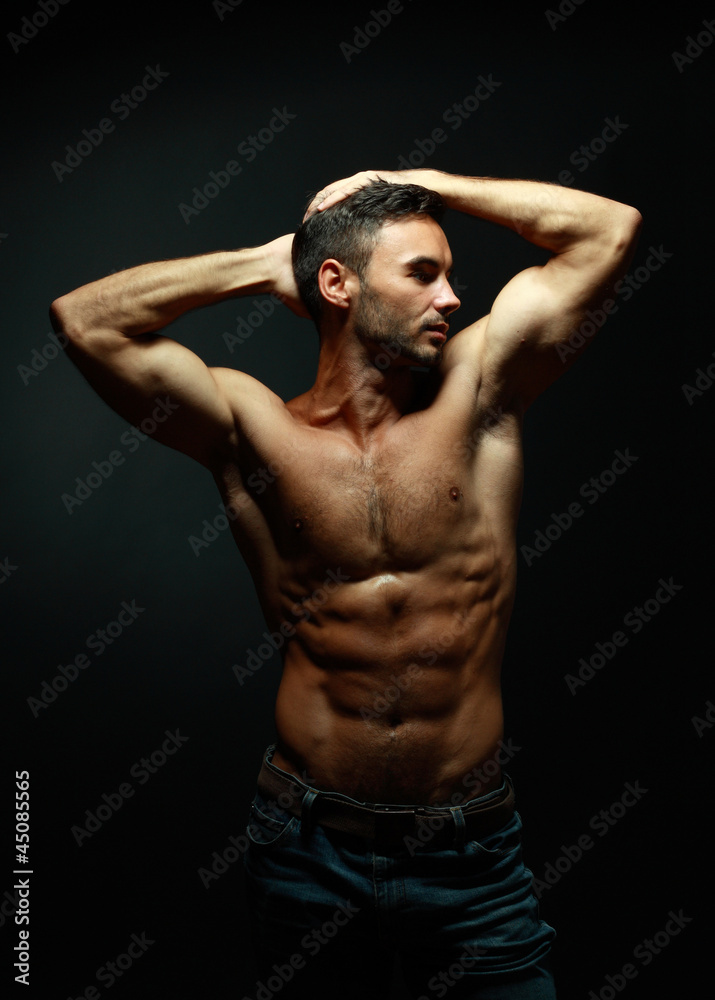 Naklejka premium portrait of topless athletic man