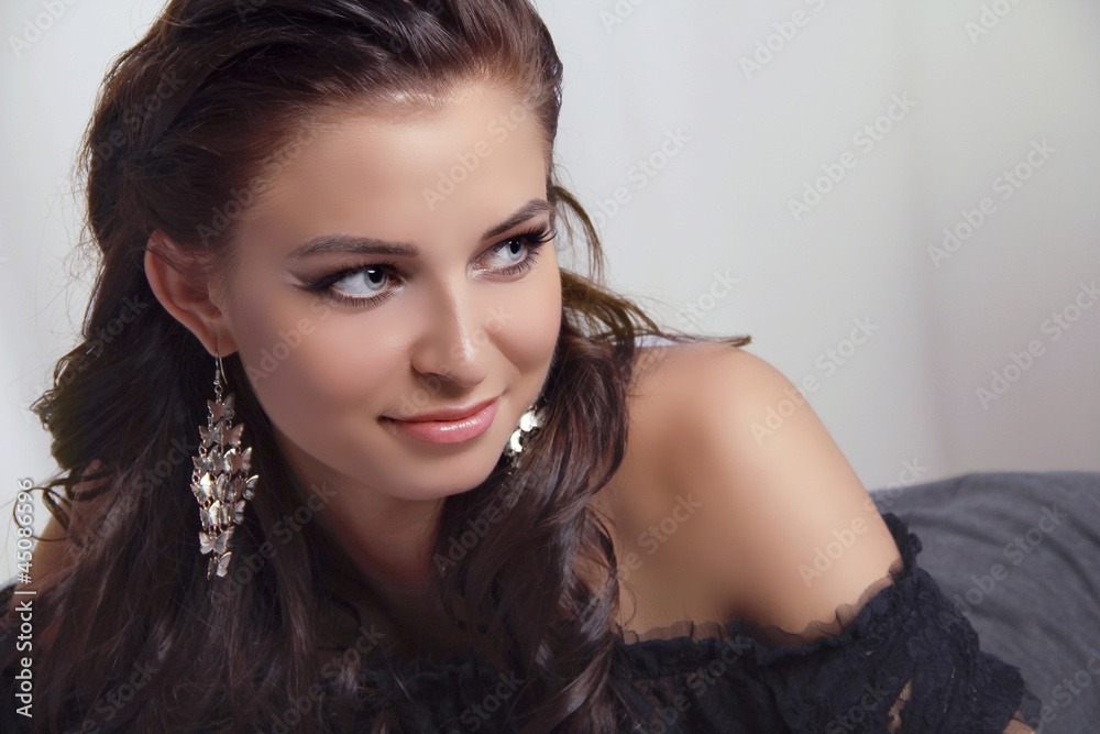 Young woman portrait of beautiful model looking away Young woman portrait of beautiful model looking away
