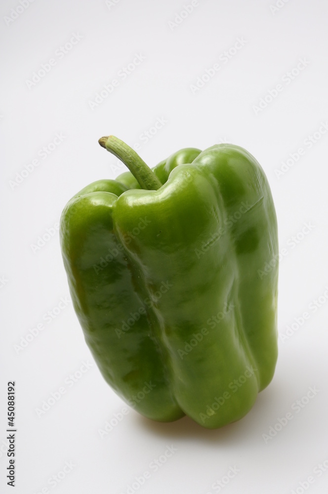 Green pepper on light background Green pepper on light background