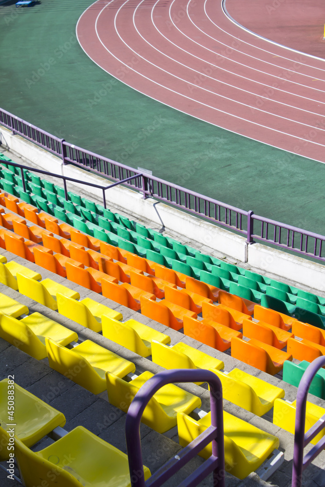 Fototapeta premium rows of plastic seats at stadium