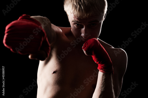 caucasian boxer with red bandage © ArtFamily