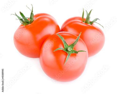 Three Fresh Red Tomatoes isolated on a white background