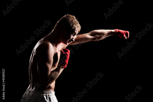 fighter over black background