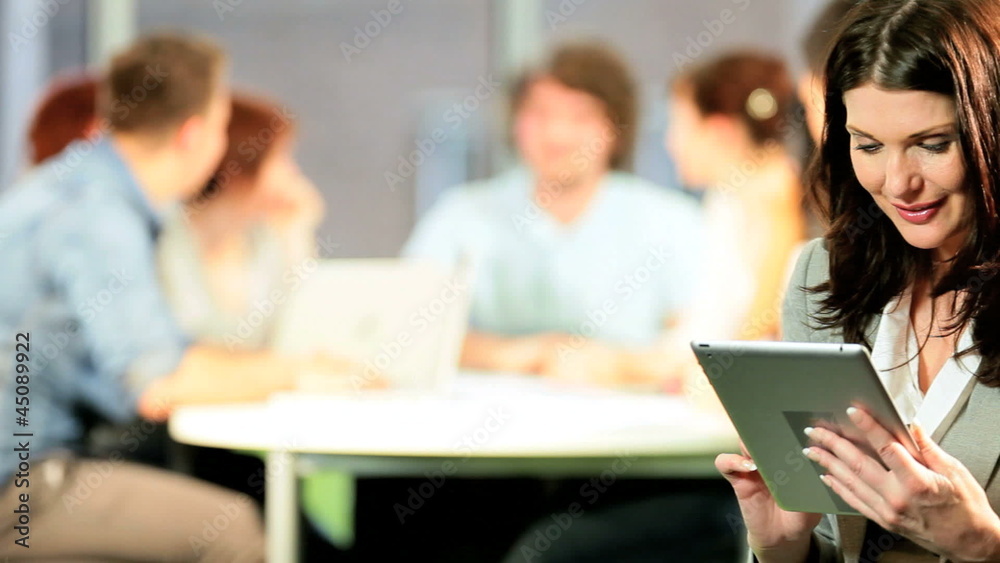 Portrait of Caucasian teacher networking on tablet Portrait of Caucasian teacher networking on tablet