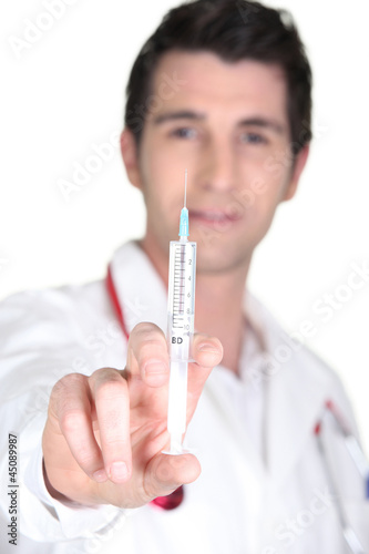 Doctor with an hypodermic needle