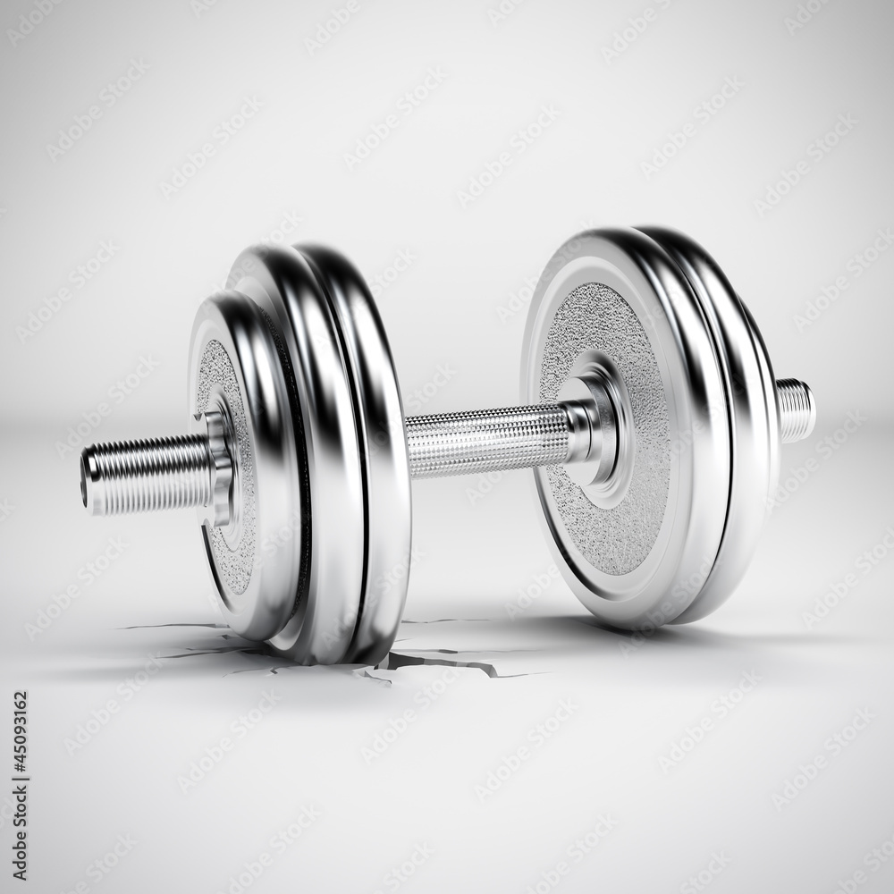 The crack on the floor and dumbbell The crack on the floor and dumbbell