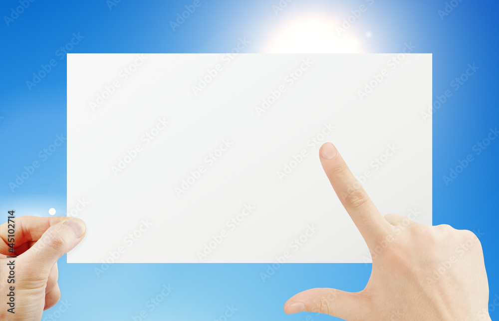 Hand holding paper Hand holding paper