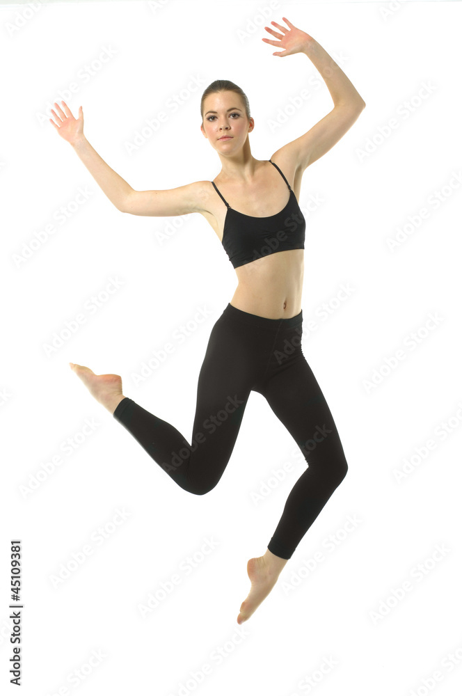 girl in black sportwear jumping