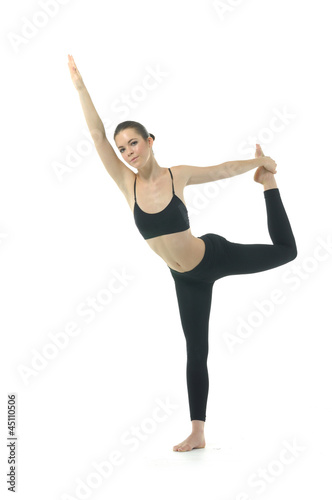 Girl doing yoga on white