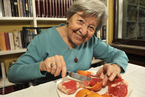 Senior Woman Enjoying Fruit 2