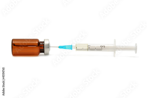 ampoule and syringe isolated on white background photo