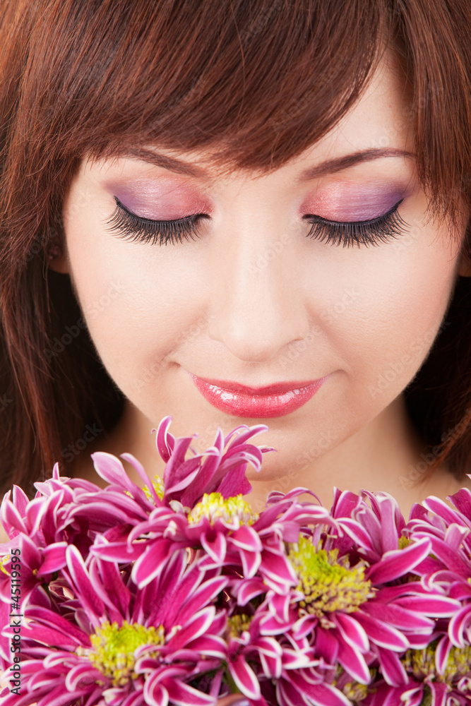 Portrait of a young beautiful woman with flowers Portrait of a young beautiful woman with flowers